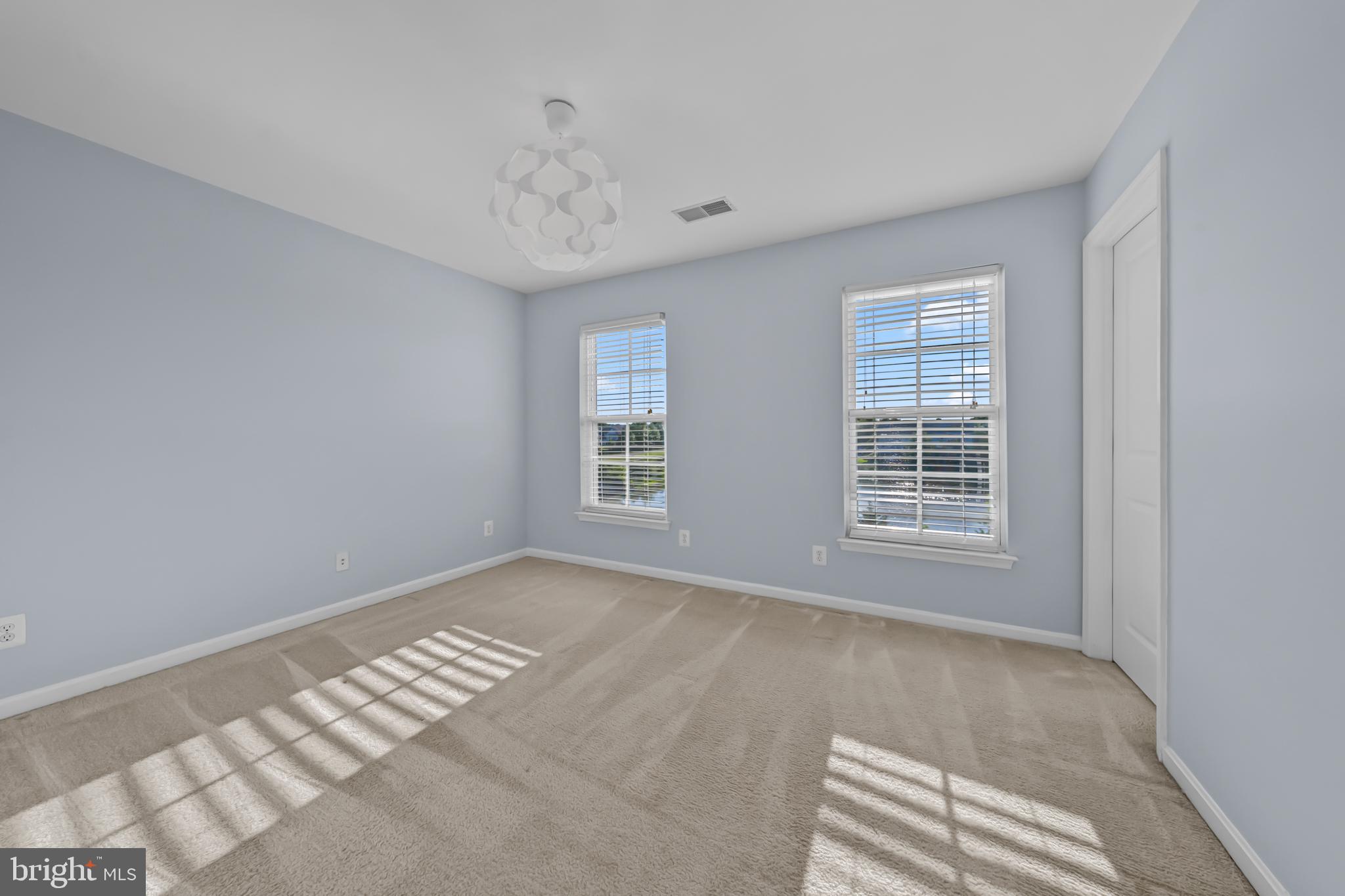 9231 Ribbon Falls Loop Bristow, VA 20136 - Photo 29 of 40 a view of an empty room with a window
