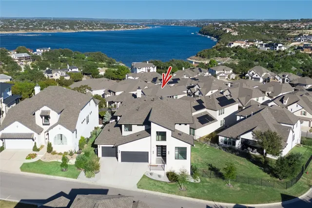 an aerial view of a house with a garden
