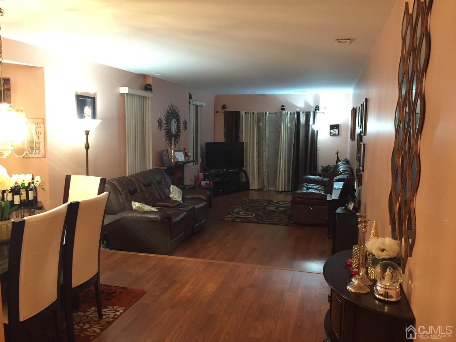 701 Jesse Way Piscataway, NJ 08854 - Photo 12 of 12 a living room with furniture and a large mirror