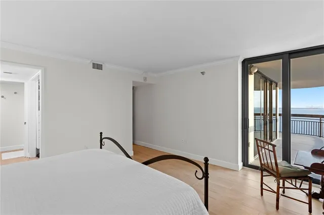 a spacious bathroom with a double vanity sink and a mirror