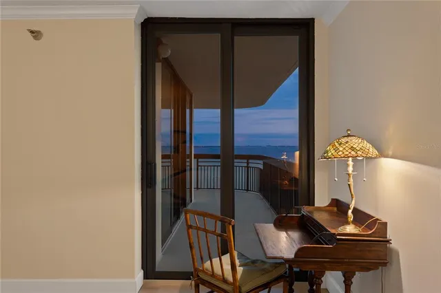 a spacious bathroom with a granite countertop sink and a mirror