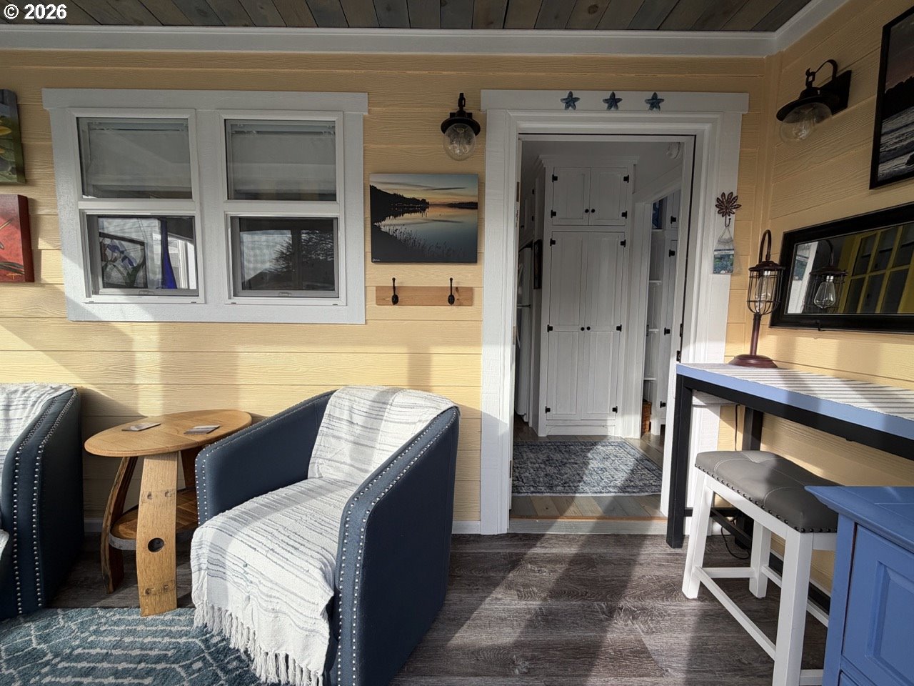 886 1st Street Southeast Bandon, OR 97411 - Photo 13 of 40 a balcony with furniture and a potted plant