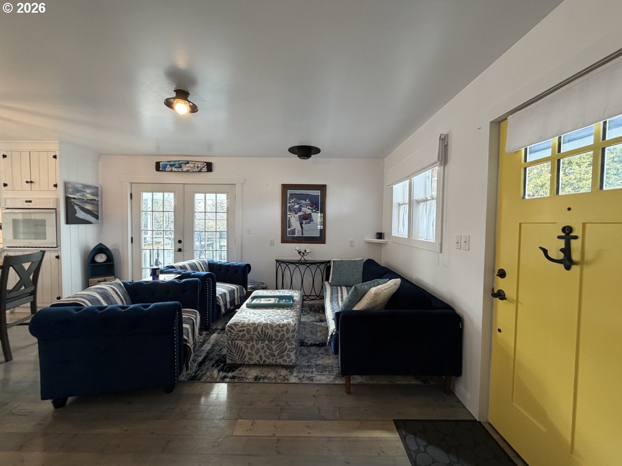 886 1st Street Southeast Bandon, OR 97411 - Photo 3 of 40 a living room with furniture and a window