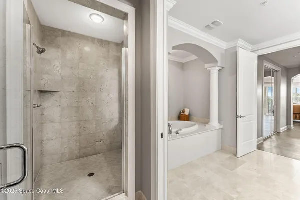 a bathroom with a sink a mirror and a shower