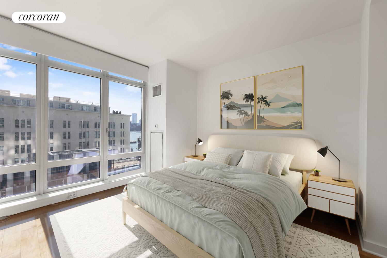 2 Northside Piers, Unit 7D Brooklyn, NY 11249 - Photo 2 of 17 a bedroom with a large bed and a large window