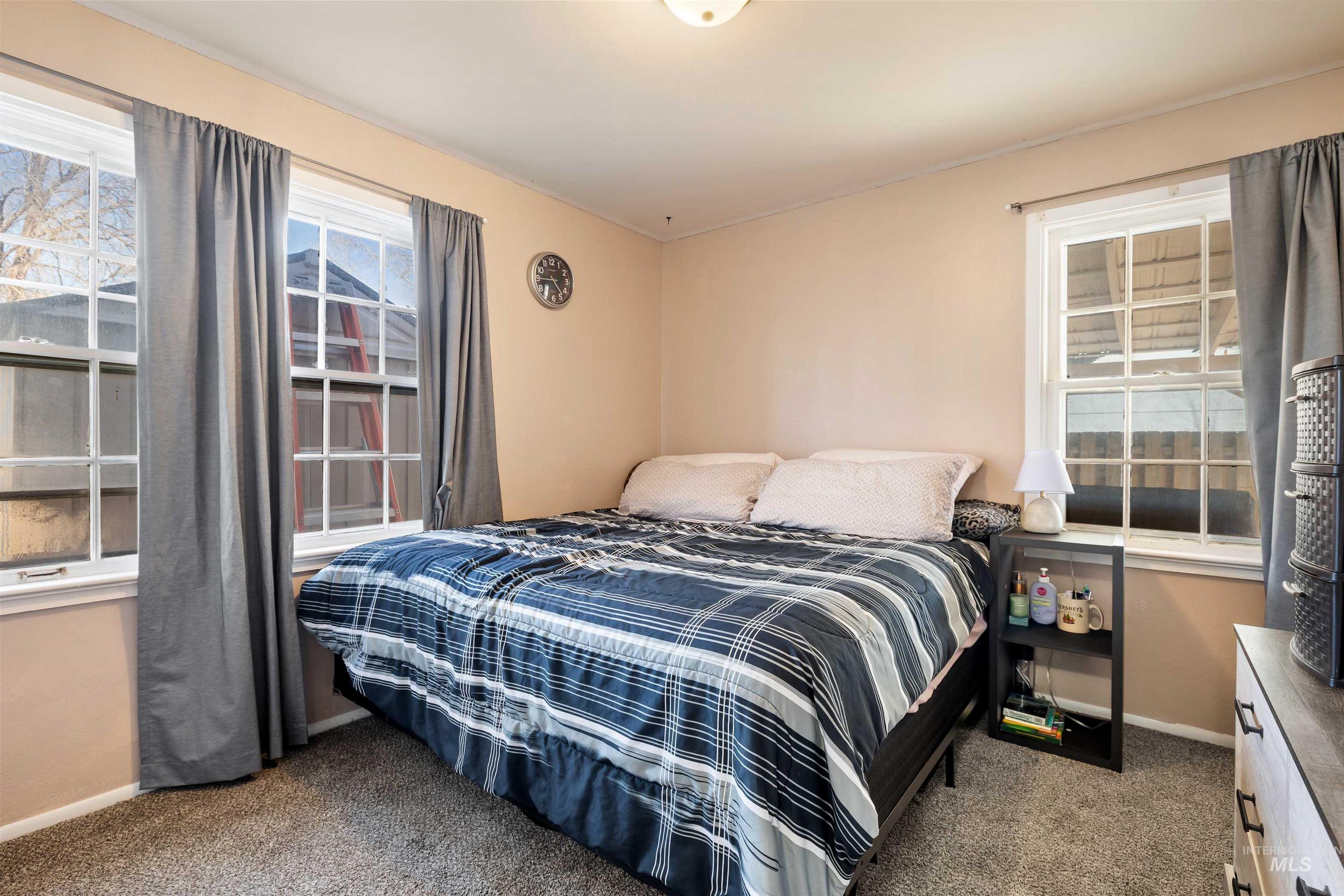 753 Ash Street Twin Falls, ID 83301 - Photo 14 of 25 Carpeted bedroom featuring baseboards