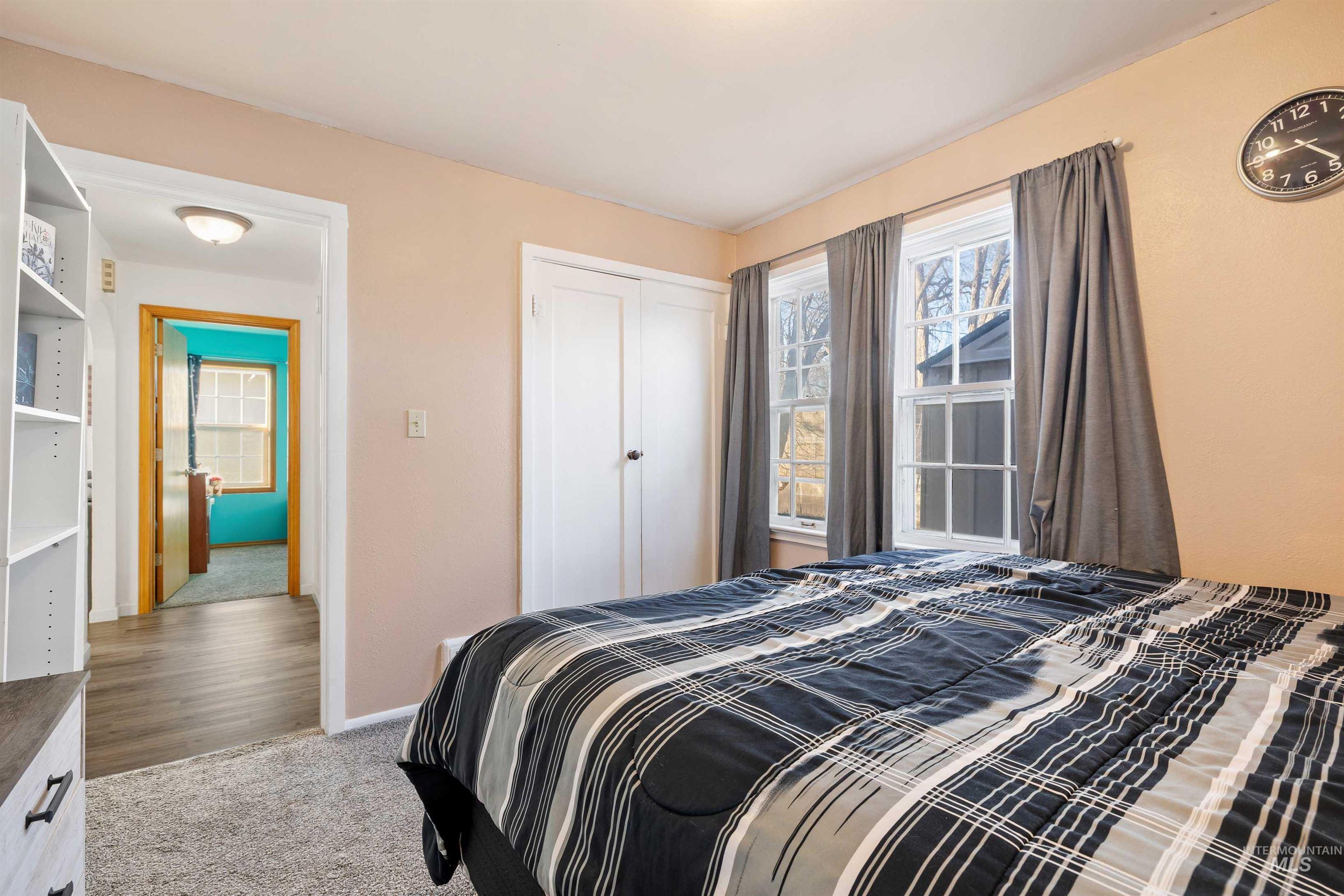 753 Ash Street Twin Falls, ID 83301 - Photo 15 of 25 Bedroom with light carpet and a closet