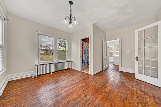 a kitchen with a refrigerator and a sink