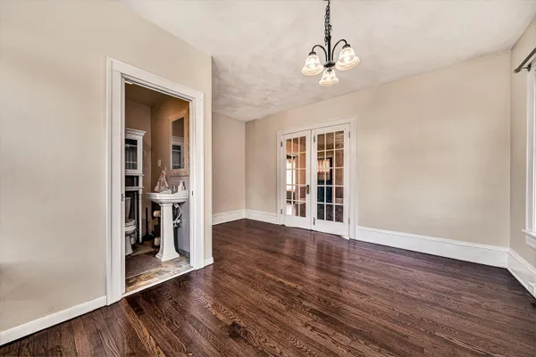 a view of a livingroom with furniture and a window