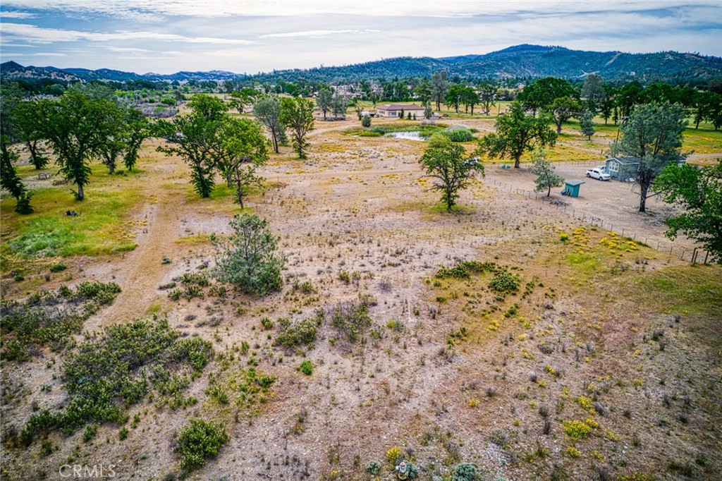 20553 Santa Clara Road Middletown, CA 95461 - Photo 6 of 10 a view of a lake with houses in the back