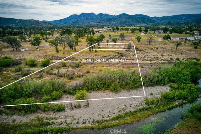a view of a mountain with a garden and a mountain