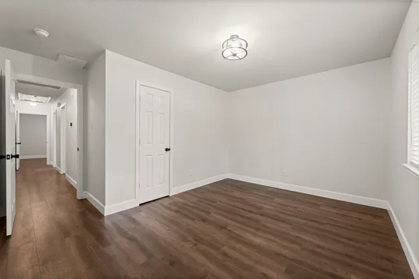 a view of an empty walk in closet