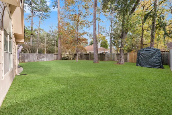 a house with garden in front of it