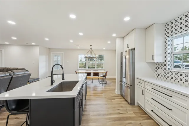 a kitchen with counter space cabinets and appliances