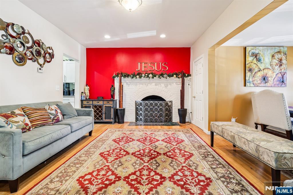28 Scheerer Avenue Newark, NJ 07112 - Photo 12 of 39 a living room with furniture and a fireplace
