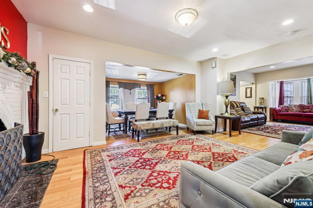28 Scheerer Avenue Newark, NJ 07112 - Photo 13 of 39 a living room with furniture and a rug