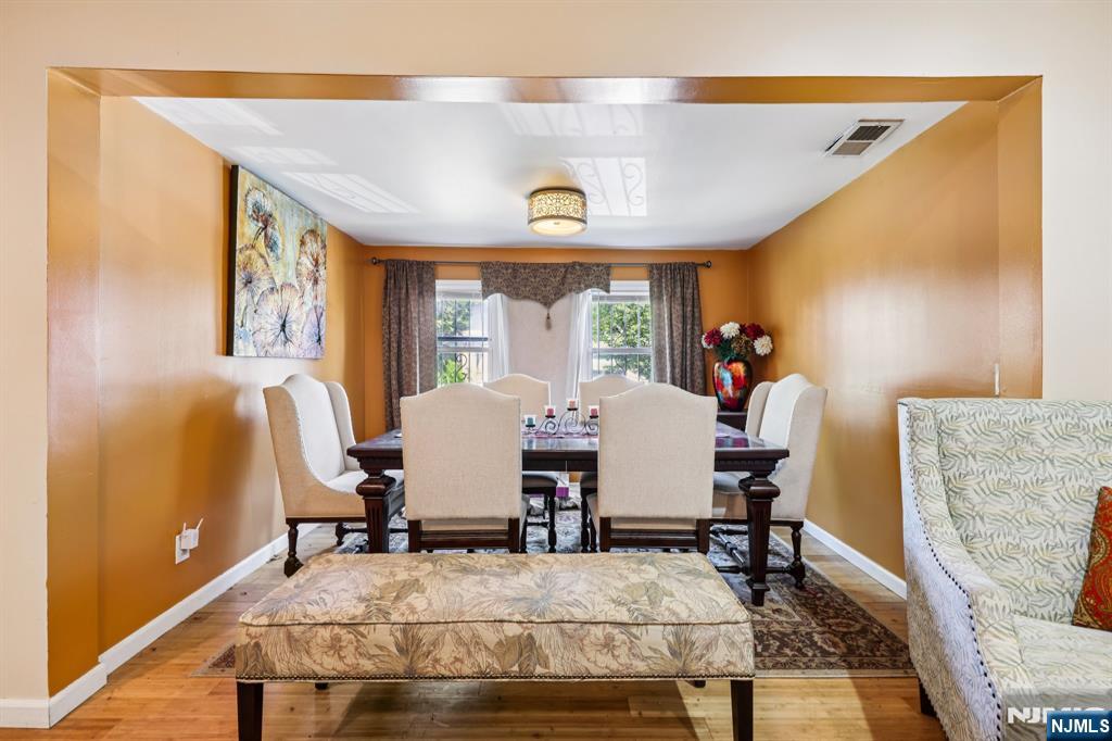 28 Scheerer Avenue Newark, NJ 07112 - Photo 14 of 39 a view of a dining room with furniture window and outside view