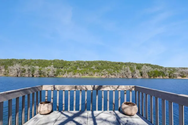 a view of park with bench and trees