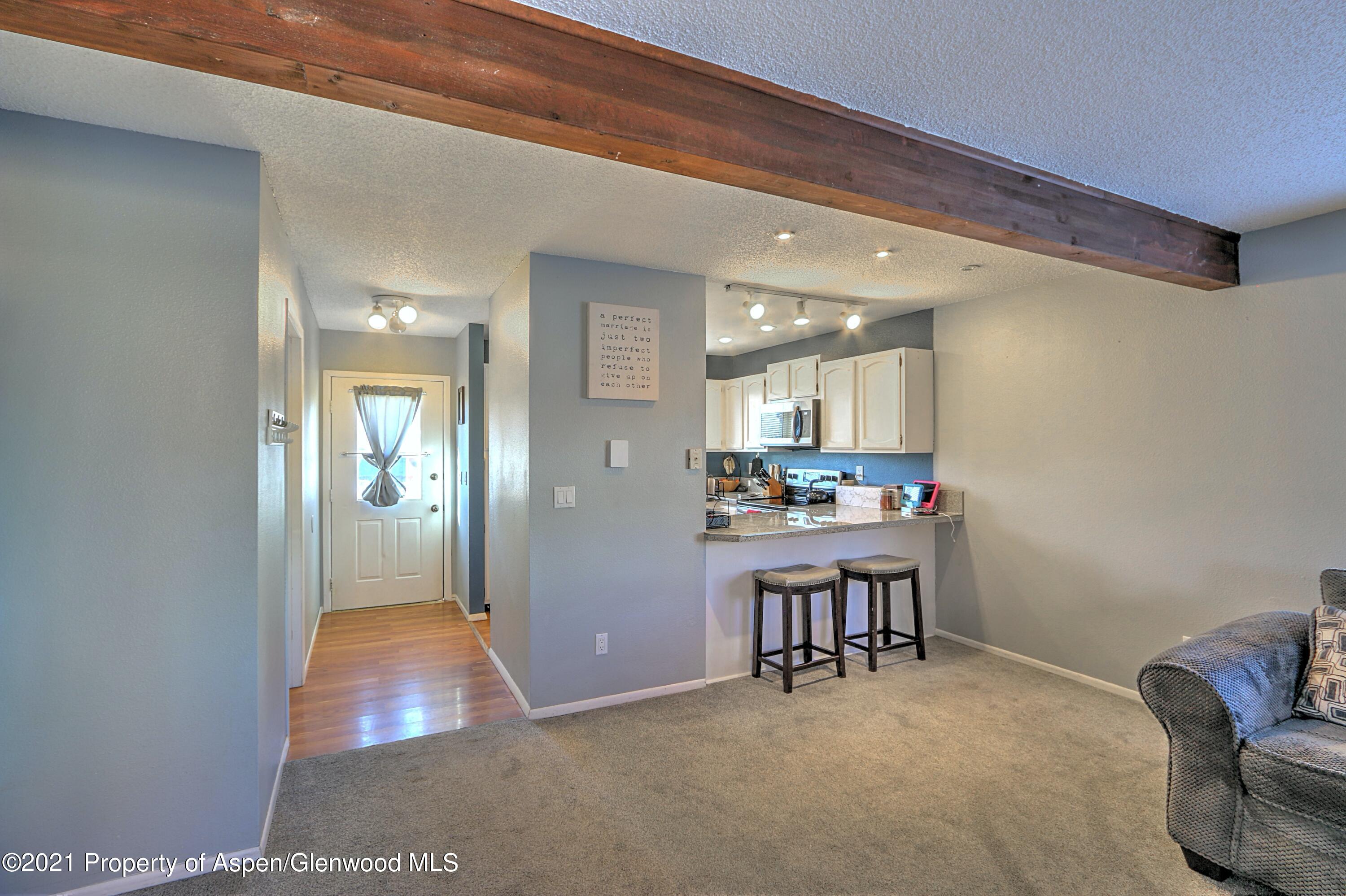 908 West 24th Street Rifle, CO 81650 - Photo 1 of 15 Great room to front door