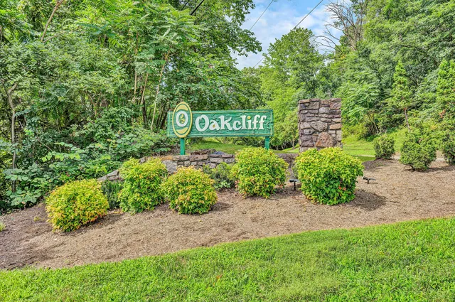 a sign that is sitting in the middle of a field