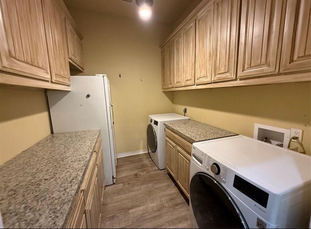 400 North Ave A Springtown, TX 76082 - Photo 17 of 19 a utility room with dryer and washer