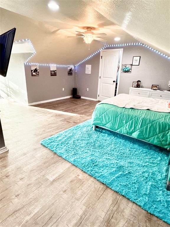 400 North Ave A Springtown, TX 76082 - Photo 5 of 19 a bathroom with a sink and a mirror