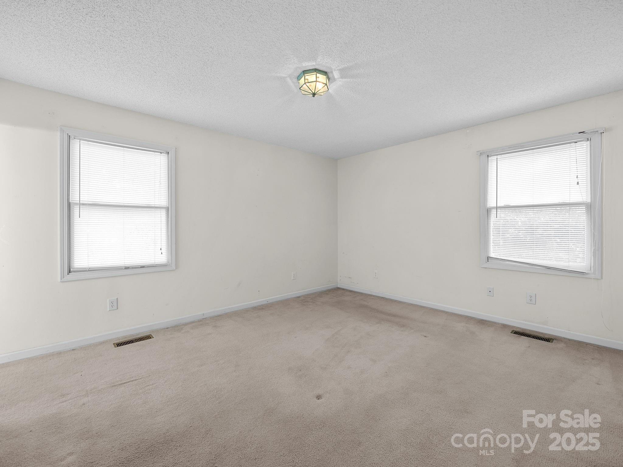 383 Woody Circle Tryon, NC 28782 - Photo 19 of 36 an empty room with a window