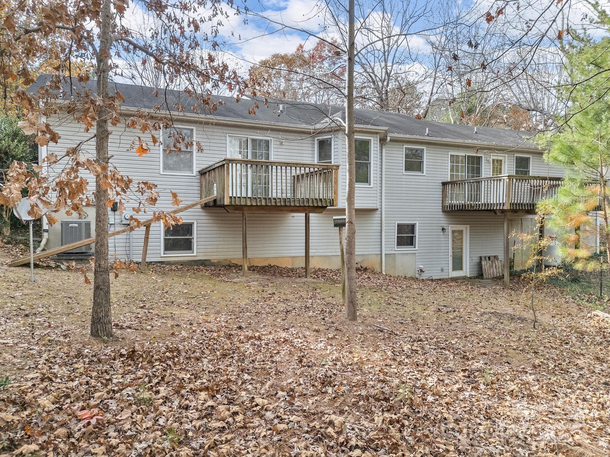 383 Woody Circle Tryon, NC 28782 - Photo 32 of 36 a backyard of a house