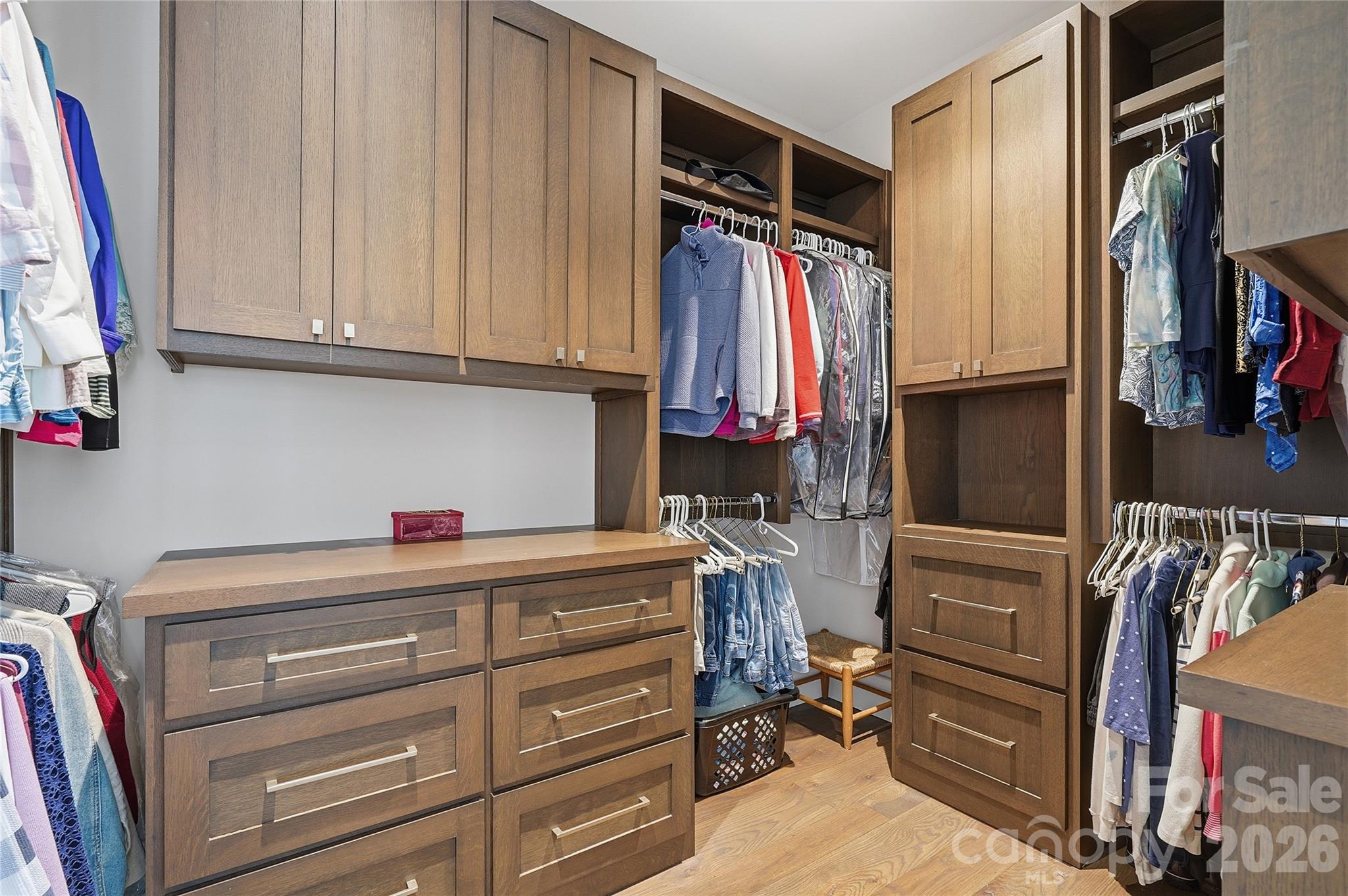 984 Mapleton Lane Tryon, NC 28782 - Photo 17 of 47 a view of walk in closet with clothes and shoes