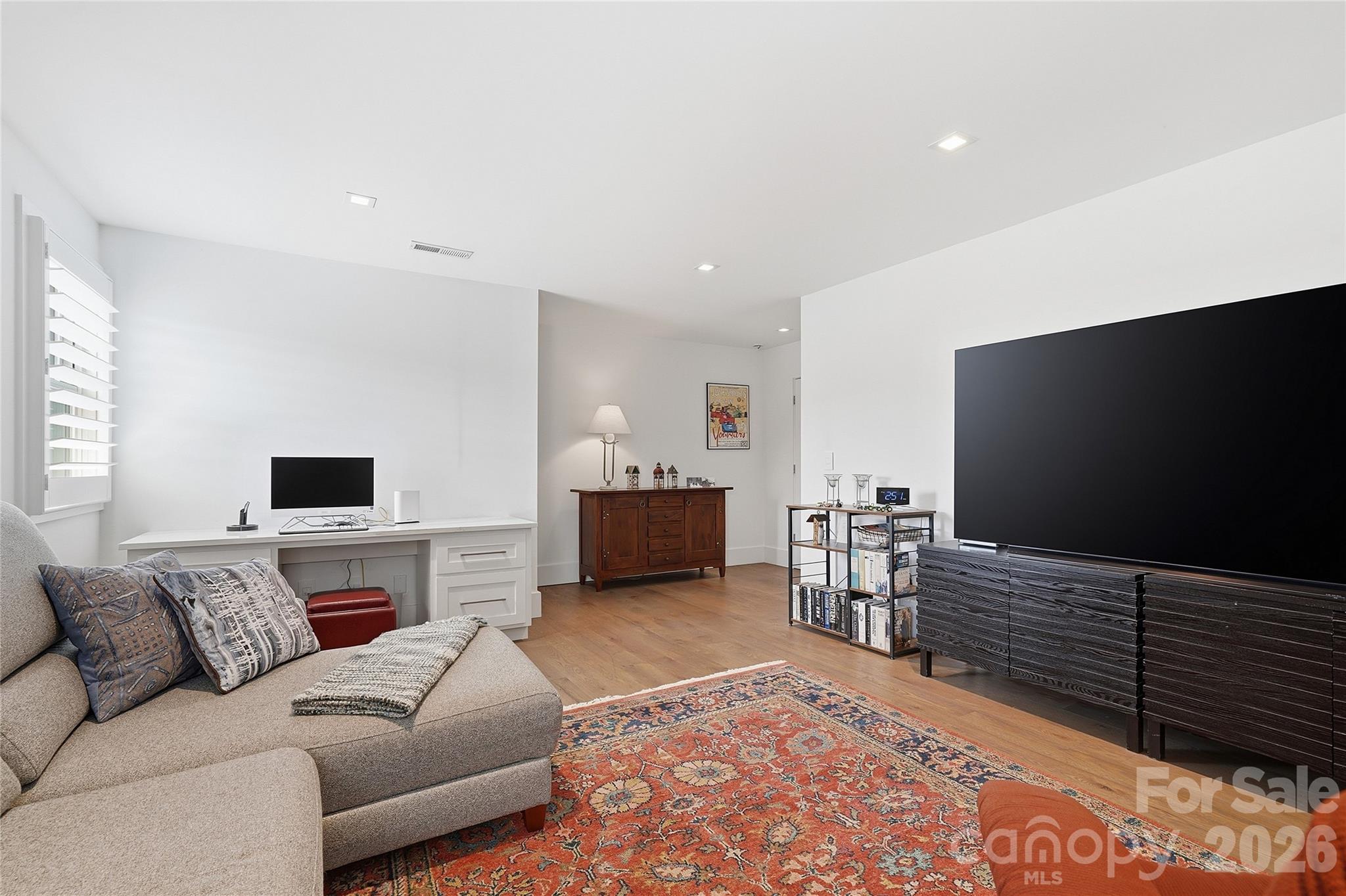 984 Mapleton Lane Tryon, NC 28782 - Photo 25 of 47 a living room with furniture and a flat screen tv