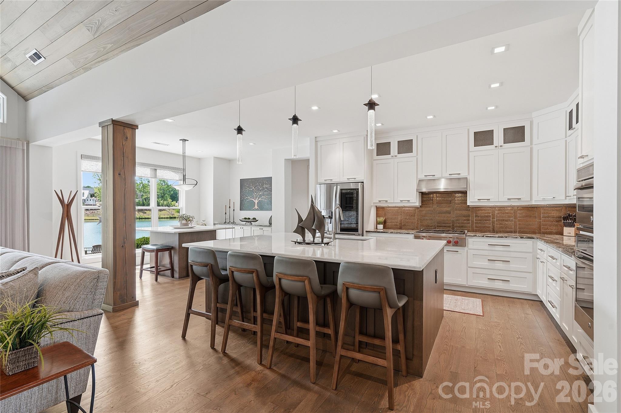 984 Mapleton Lane Tryon, NC 28782 - Photo 34 of 47 a large kitchen with a table and chairs