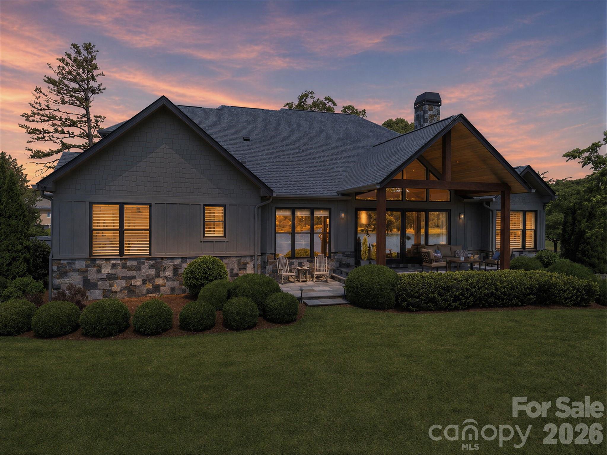 984 Mapleton Lane Tryon, NC 28782 - Photo 38 of 47 a front view of a house with a garden