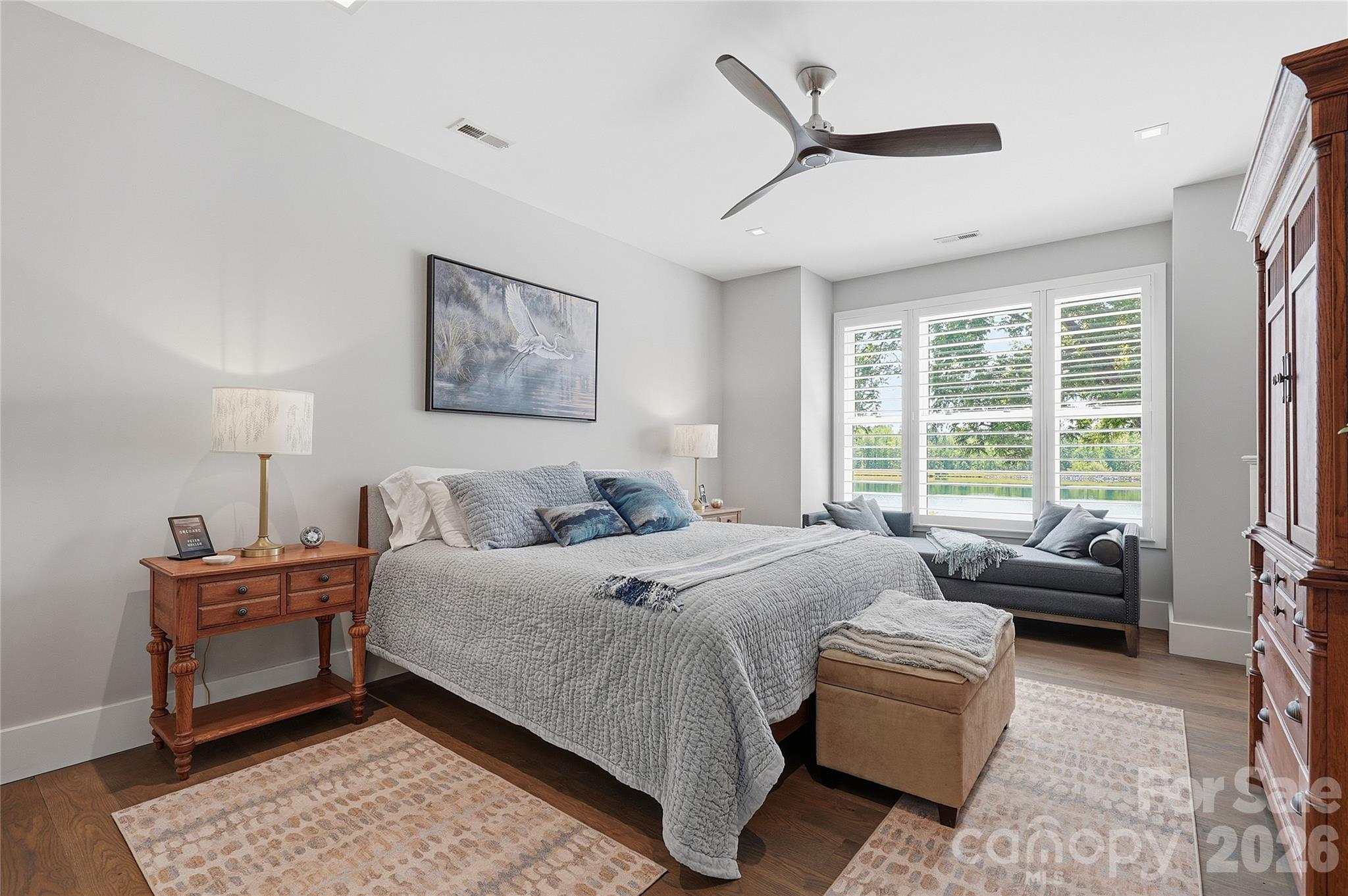 984 Mapleton Lane Tryon, NC 28782 - Photo 10 of 47 a bedroom with a bed couch and a large window