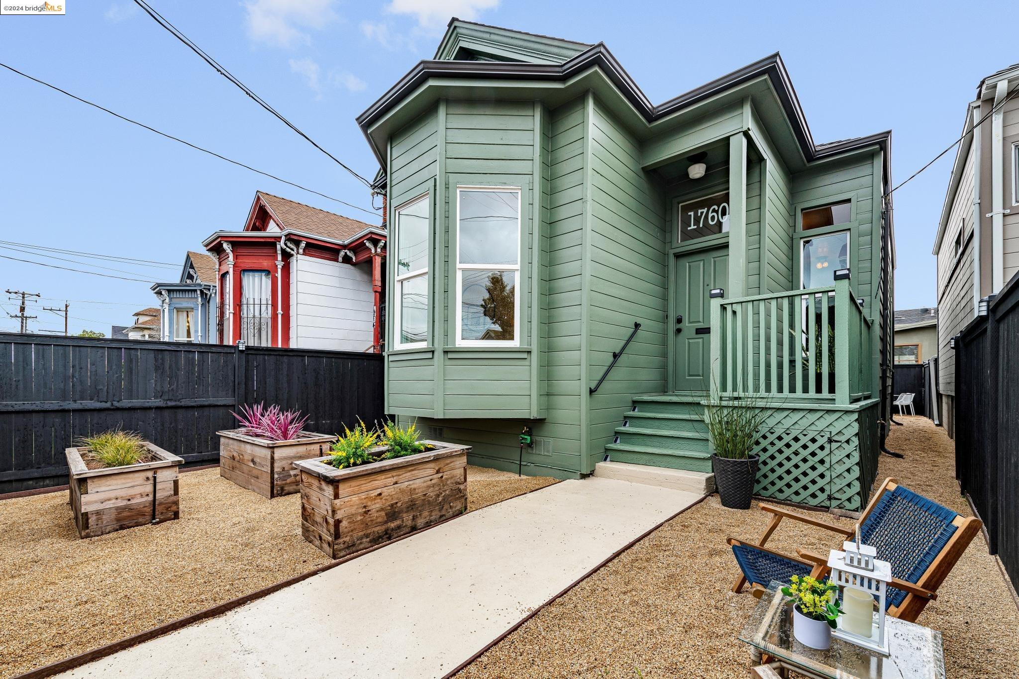 1760 9th Street Oakland, CA 94607 - Photo 1 of 1 a chairs and a table in the balcony