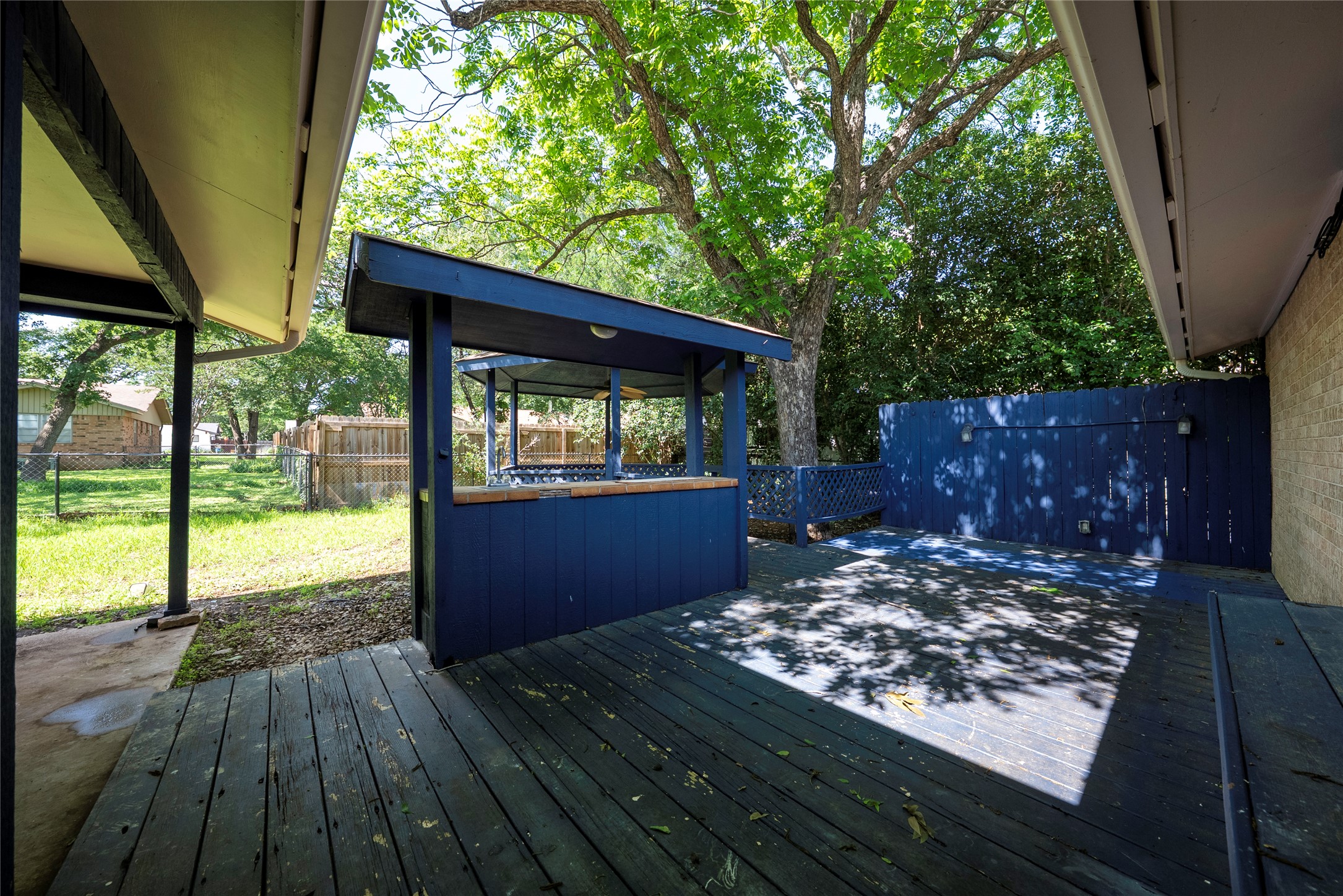 807 Country Club Road Georgetown, TX 78628 - Photo 25 of 28 a view of a porch with wooden floor
