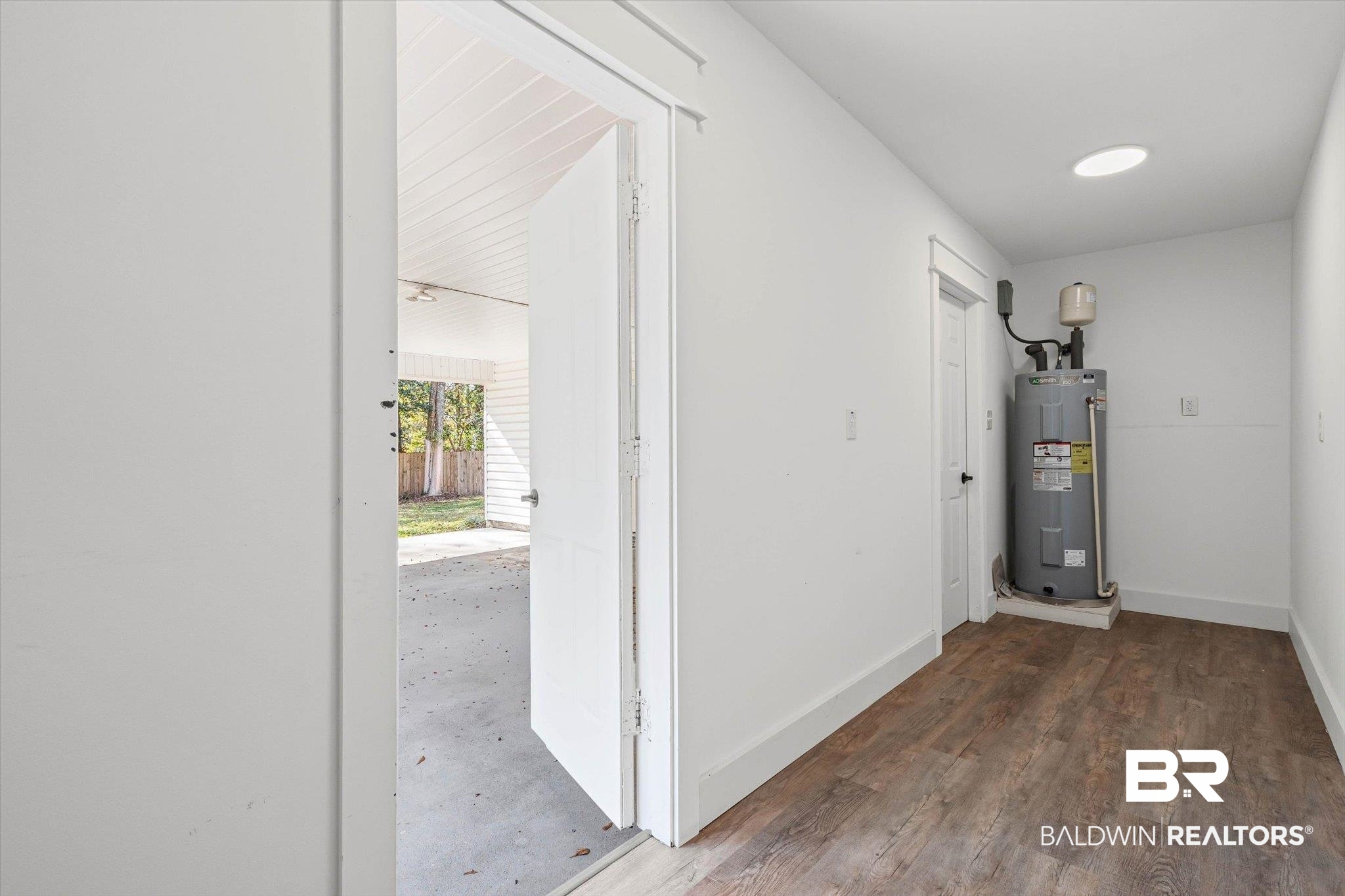 3933 Radnor Avenue Mobile, AL 36608 - Photo 27 of 36 Garage Storage Room with hot water heater.