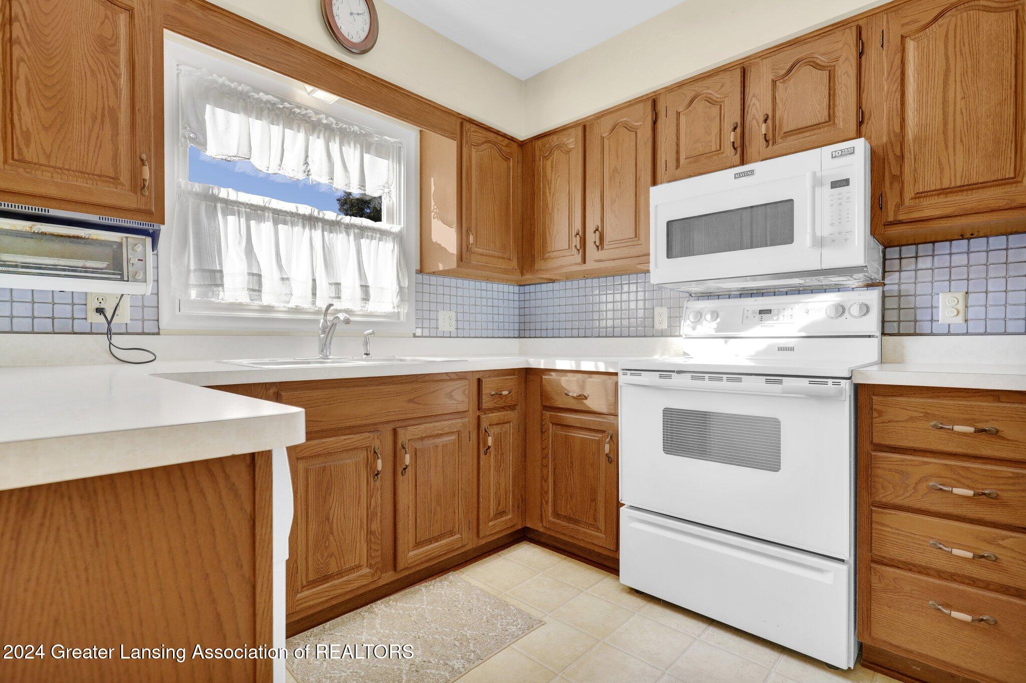 3412 Springbrook Lane Lansing, MI 48917 - Photo 7 of 35 12-web-or-mls-Open Ended Media-12