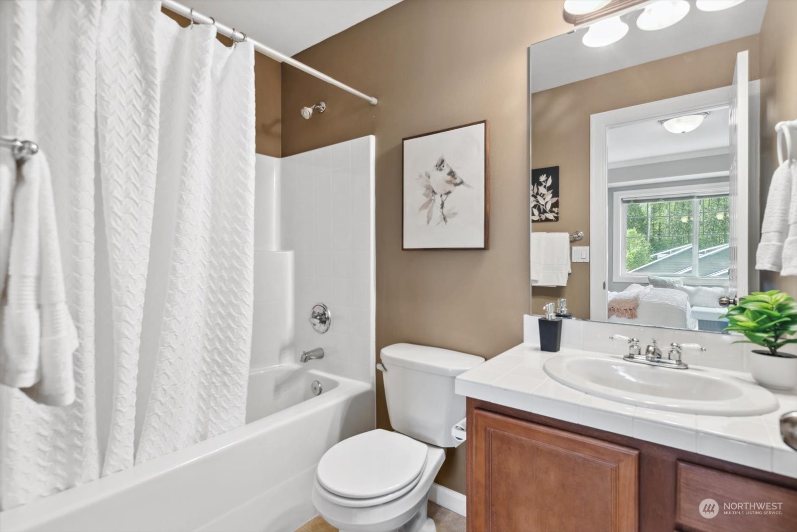 21220 11th Drive Southeast Bothell, WA 98021 - Photo 26 of 37 a bathroom with a sink toilet and shower