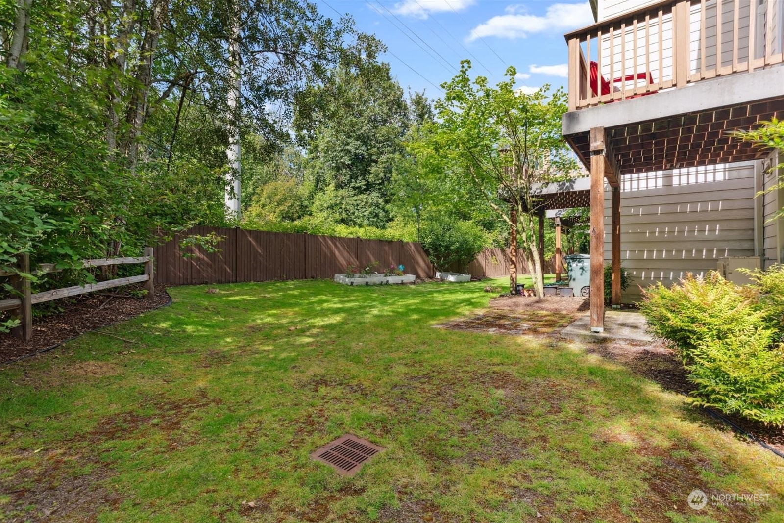 21220 11th Drive Southeast Bothell, WA 98021 - Photo 32 of 37 a view of backyard with swimming pool and seating area
