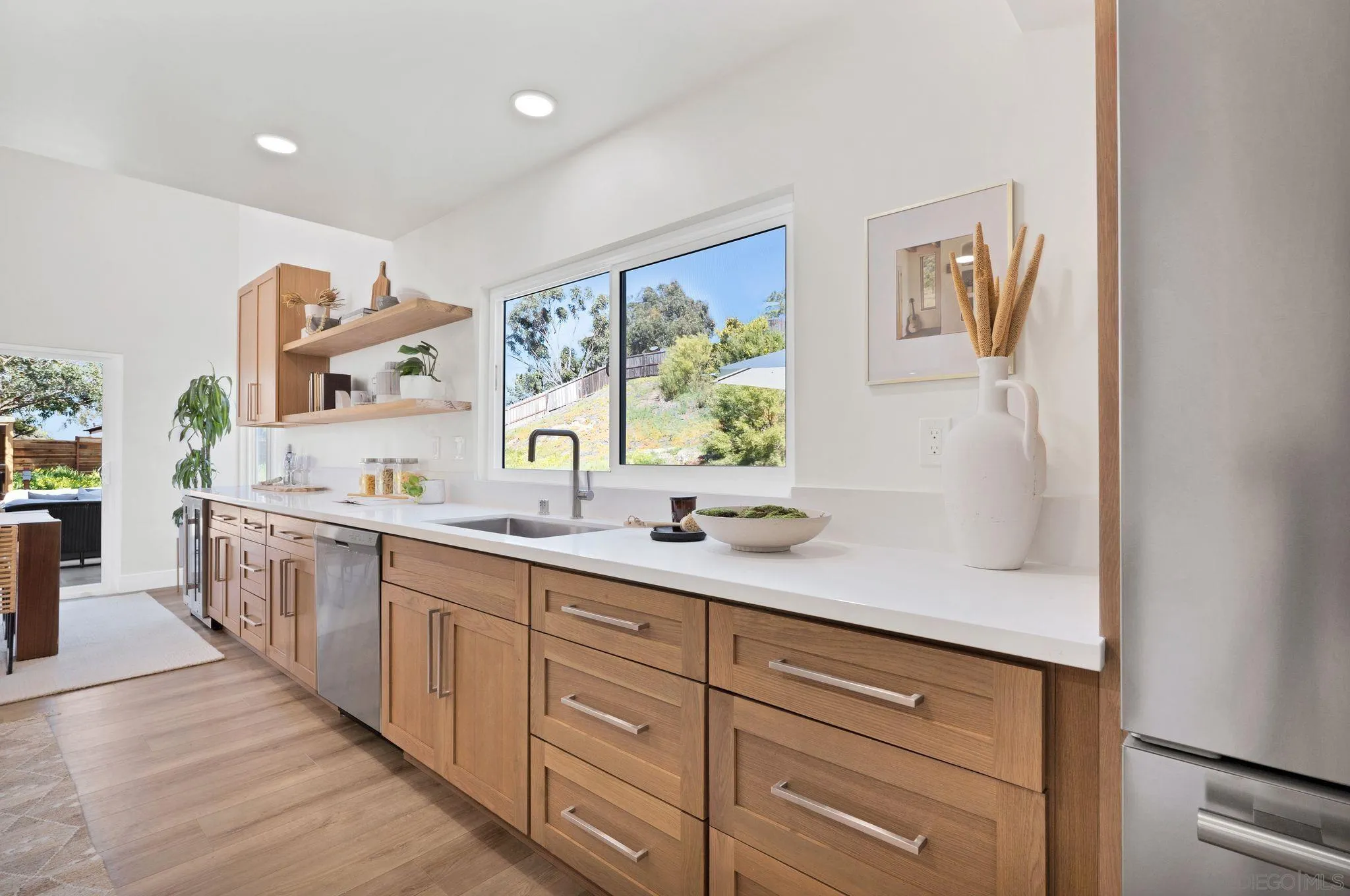 7815 Quebrada Circle Carlsbad, CA 92009 - Photo 13 of 32 a bathroom with a sink and a mirror