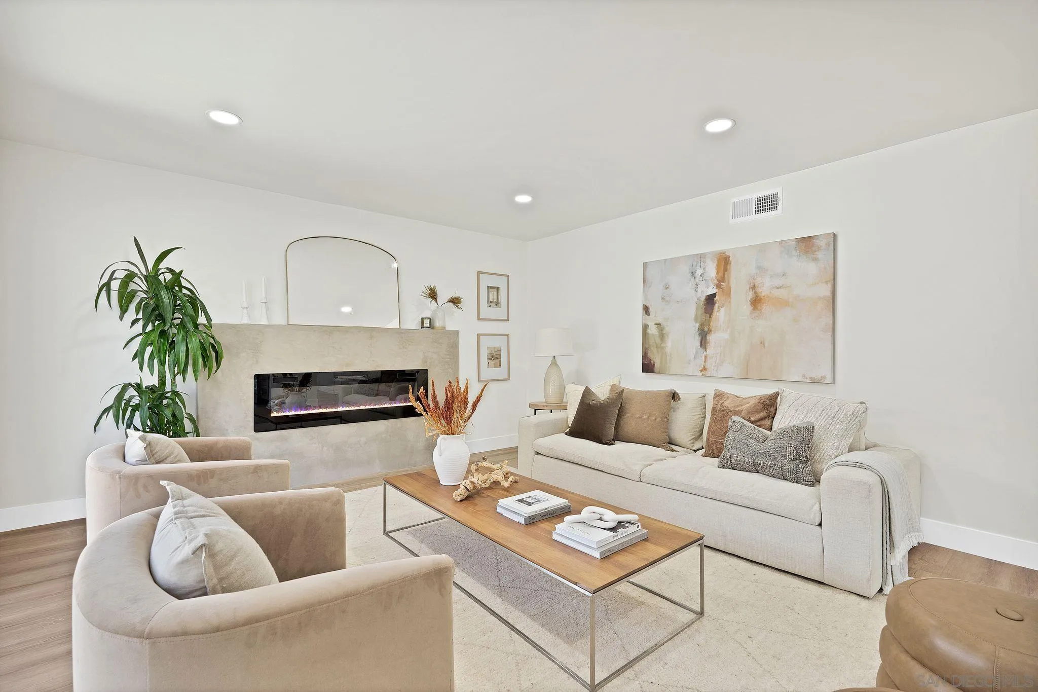 7815 Quebrada Circle Carlsbad, CA 92009 - Photo 16 of 32 a living room with furniture and a fireplace