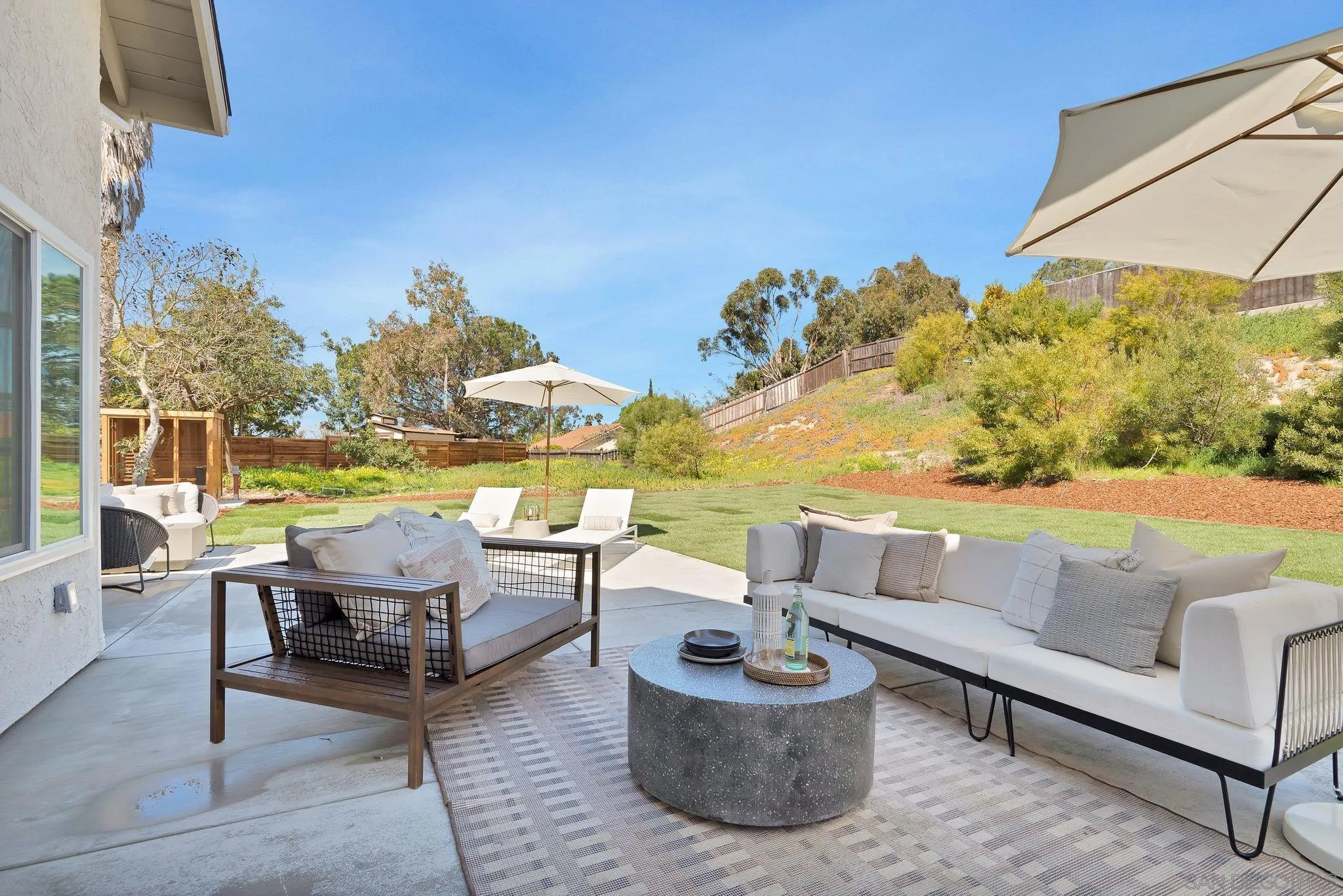 7815 Quebrada Circle Carlsbad, CA 92009 - Photo 27 of 32 a outdoor living space with furniture and city view