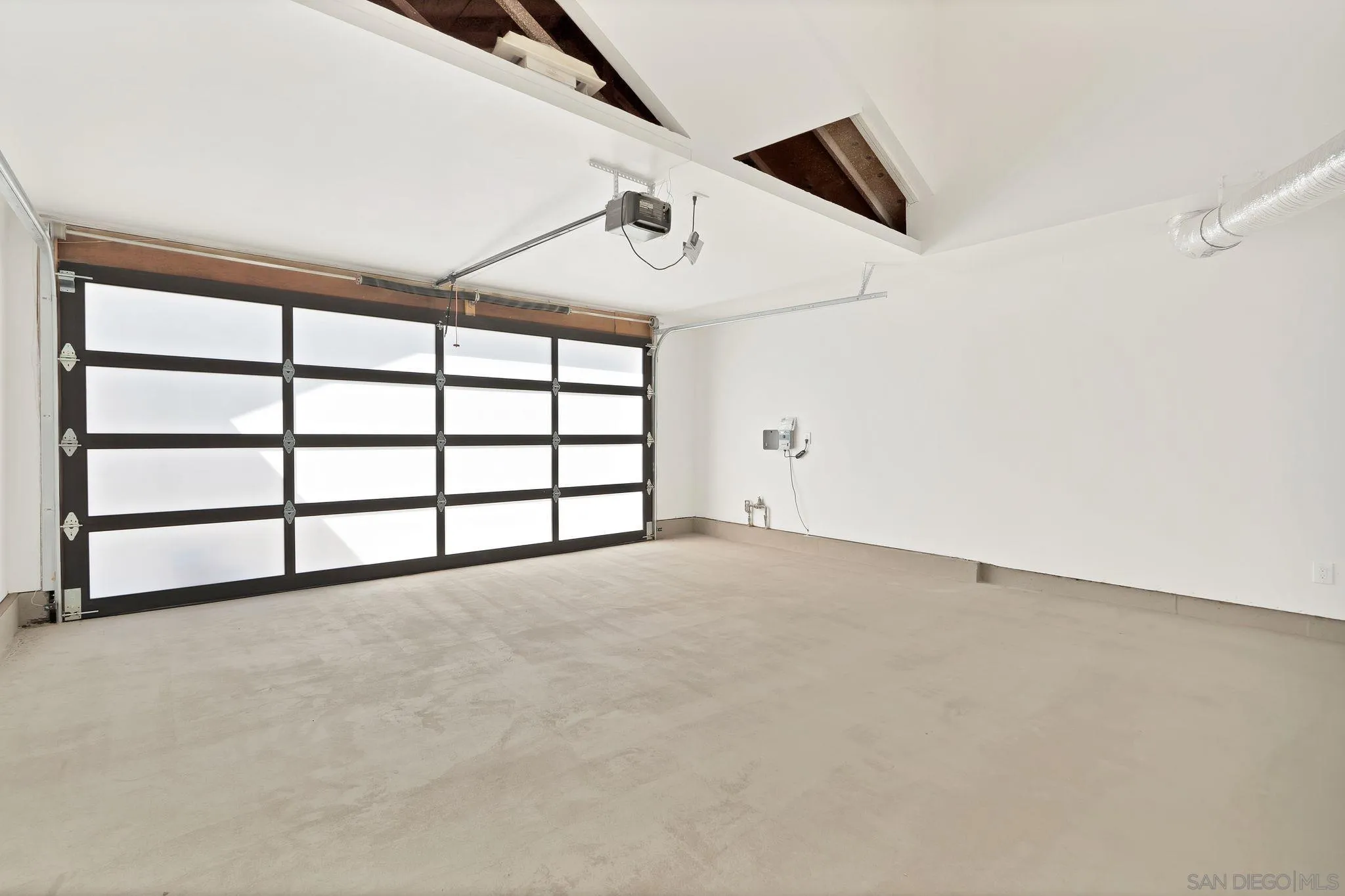 7815 Quebrada Circle Carlsbad, CA 92009 - Photo 31 of 32 wooden floor in an empty room with a window