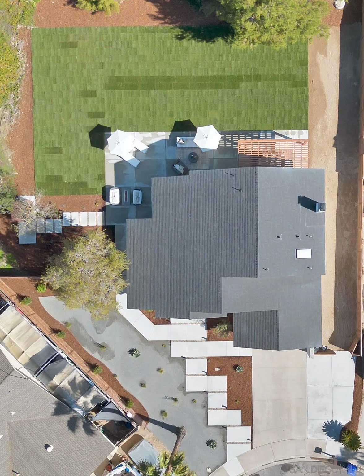 7815 Quebrada Circle Carlsbad, CA 92009 - Photo 32 of 32 an aerial view of a house with a yard