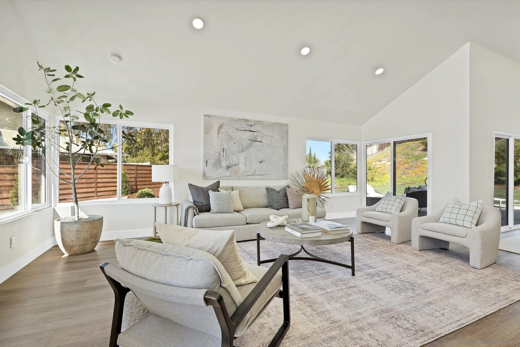 7815 Quebrada Circle Carlsbad, CA 92009 - Photo 5 of 32 a living room with furniture and a large window