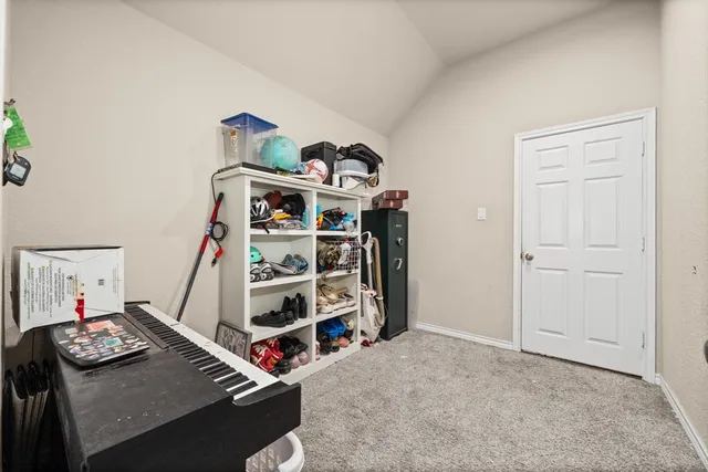 a view of a house with backyard and porch