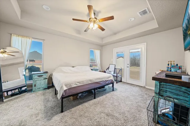 a front view of a house with yard