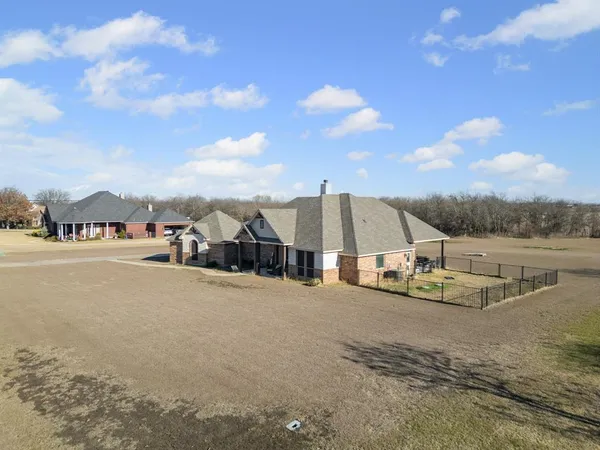 a view of a town with barn house