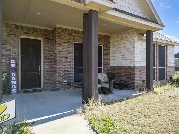 a view of house with patio