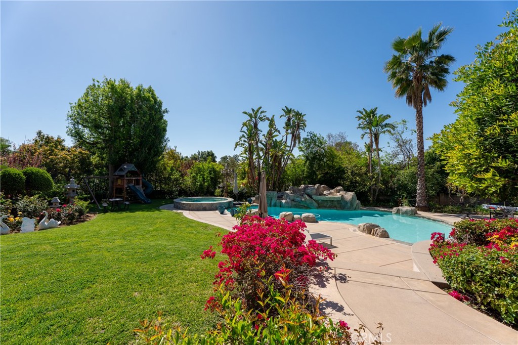 894 Fallen Leaf Road Arcadia, CA 91006 - Photo 23 of 28 a view of a garden with flowers and trees